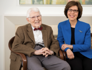 Aaron and Judith Beck smiling on the couch