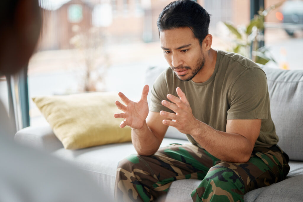 Young man meeting with a therapist.