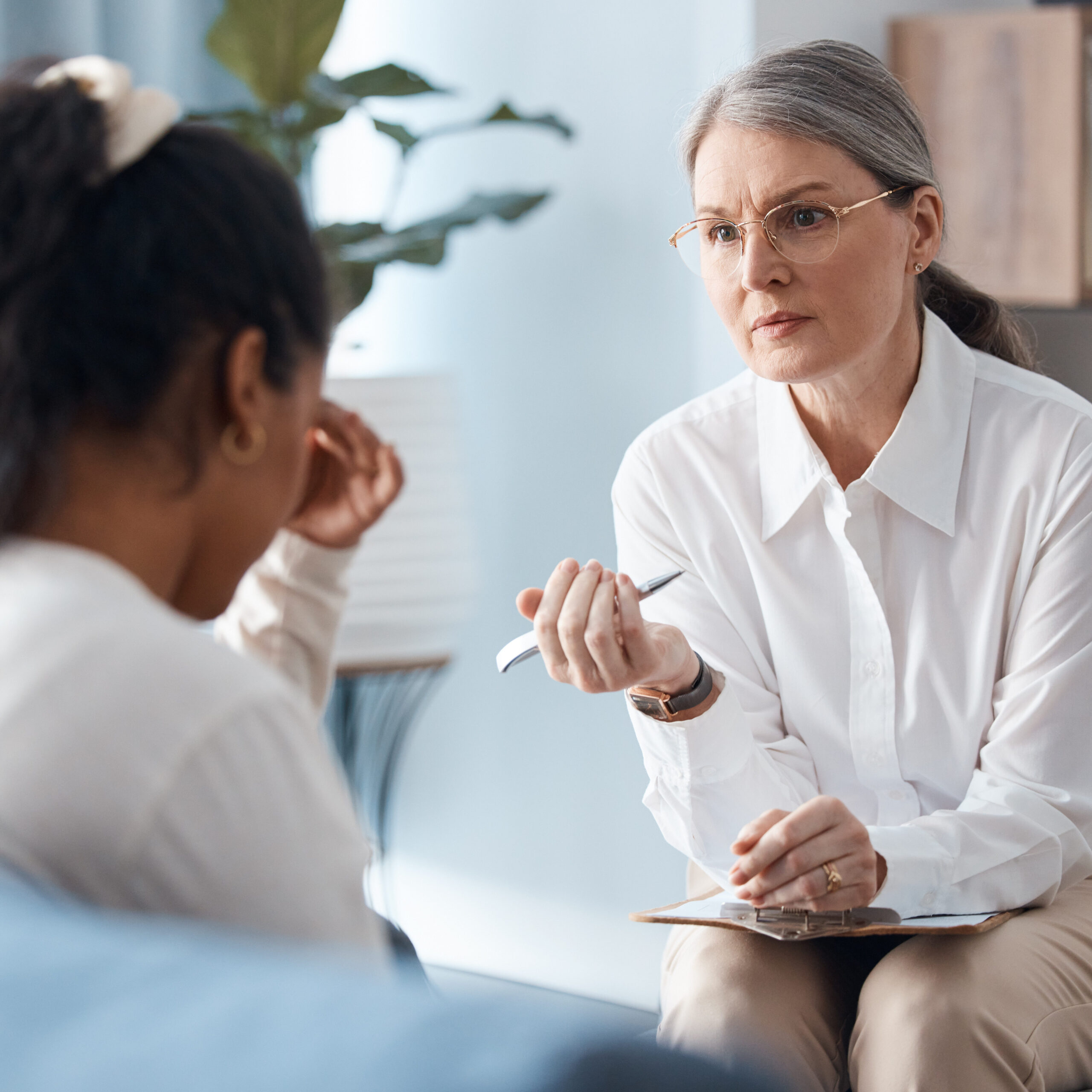A female therapist in session with a female client.