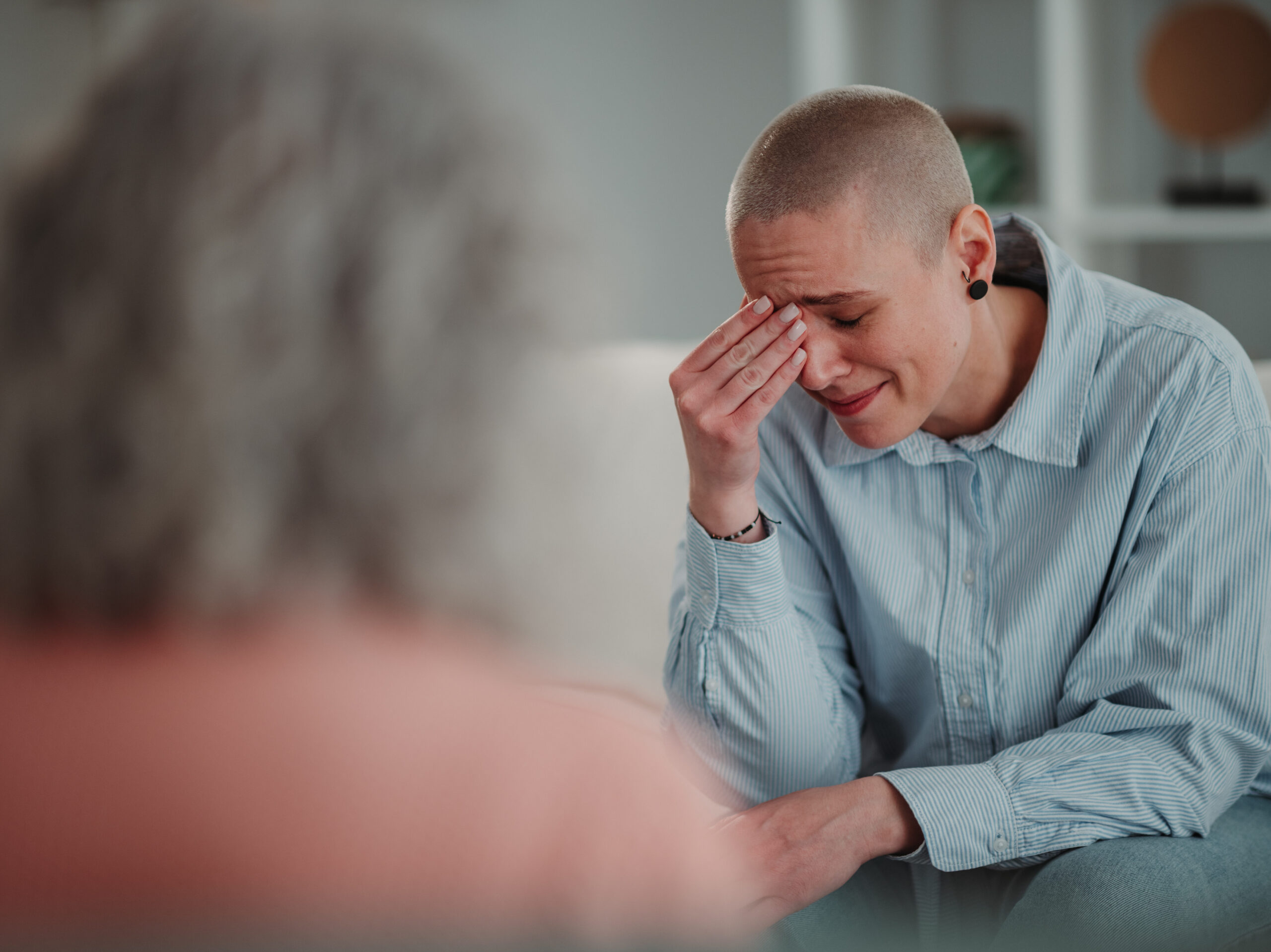 Young woman crying during a counseling session