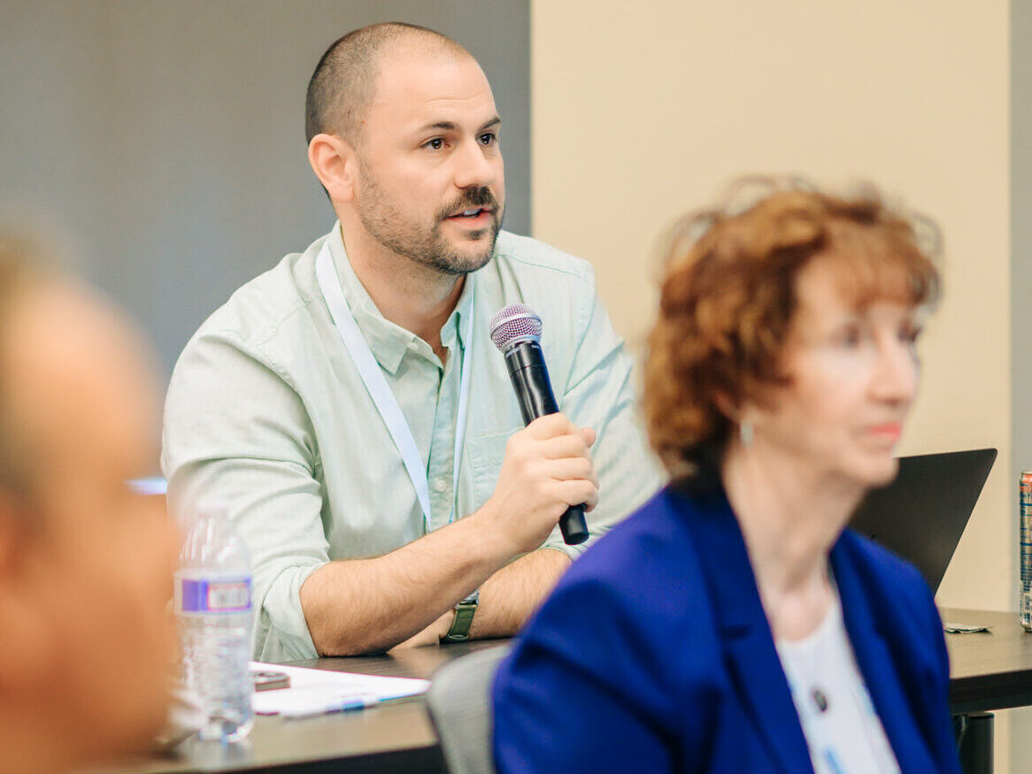 A trainee asks a question at a Beck Institute workshop.